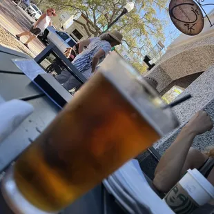 a glass of beer on a table