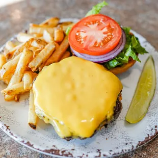 a cheeseburger and fries
