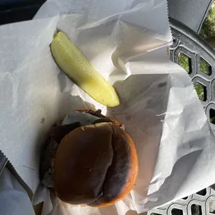 a hamburger and pickle