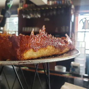 The true sign of a legit Detroit style pizza.