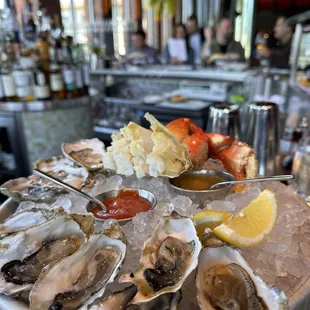 6 Chefs Choice $1.50 oysters and 6 $4.80 Kumamoto oysters, and half Dungeness crab.