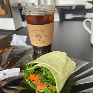 Delicious veggie wrap and cold brew coffee.