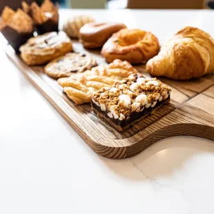 a variety of pastries on a cutting board