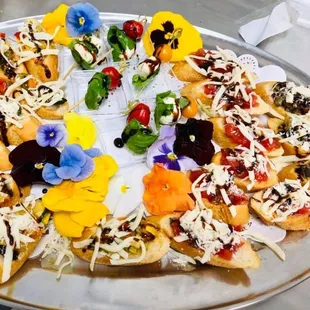 Brushetta with three flavor options; Fresh Tomato, Roasted Vegetable or Olive Tepenade