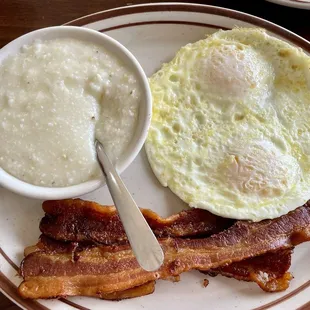 COWBOY-Eggs over medium, crispy bacon &amp; grits