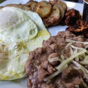 Huevos Rancheros ( burned chorizo on the side)