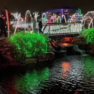 Gardens Aglimmer winter event 2023: 'Candy cane lane' over the waterfall walking path