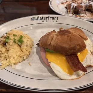 Croissant breakfast sandwich &amp; cheesy hash browns