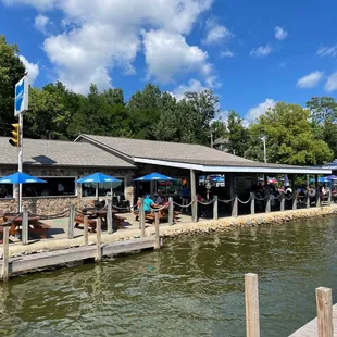  dock with tables and umbrellas