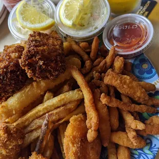 a plate of fried fish and fries