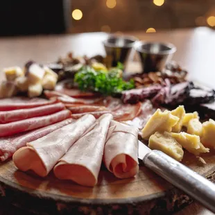 a platter of meats and cheeses