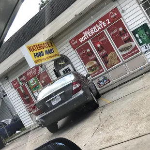 a car parked in front of a store