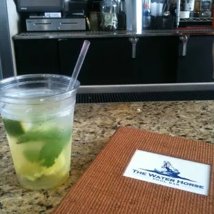 a drink in a plastic cup