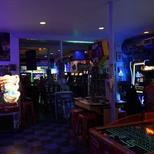 a game room with arcade machines