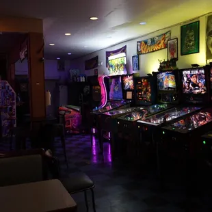 a row of pinball machines