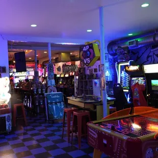 a game room with arcade machines