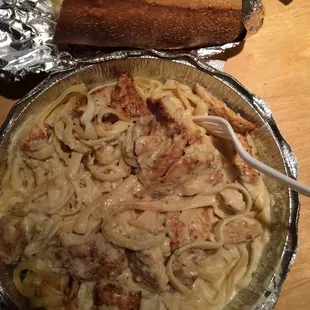 Chicken Alfredo is great and plenty for two garlic bread and side salad not so great, can do w/o.