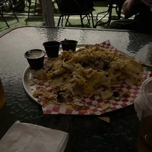 Nachos no bueno. Tastes like Santitas smothered in Kirkland canned chicken and Safeway three cheese blend. Elk Grove sucks.