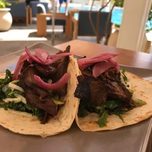 Two tacos and a beer $15