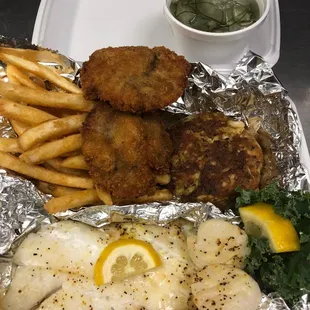 Captains Catch- 1filet Orange Roughy 2 scallops, 2 oyster paddies, 1 lump crab cake served w/ 2 sides