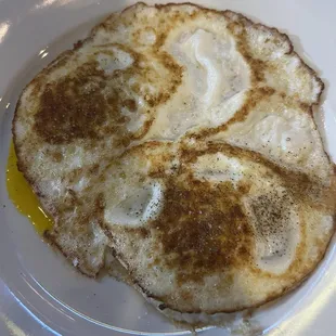 Over easy eggs, fried a little too hard but still good.
