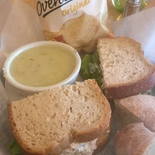 Chicken salad sandwich with cream of asparagus soup.