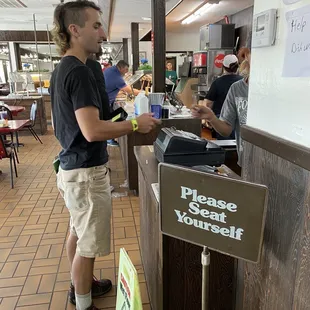 Pay by the door after you eat.