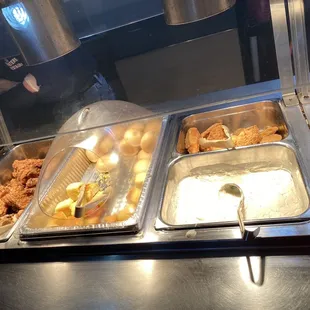 Fried catfish, cornbread and dinner rolls, chicken tenders
