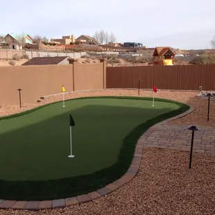 a backyard putting green