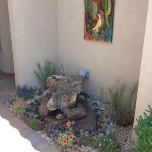 a fountain in a garden