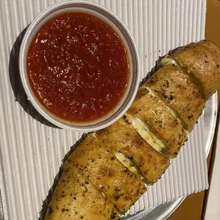 3 cheese Stromboli and sauce