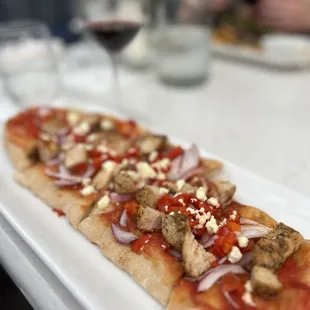 Greek flatbread with added chicken -$25