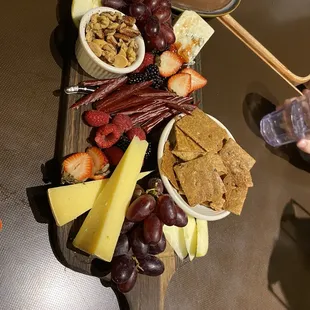 a platter of fruit and snacks