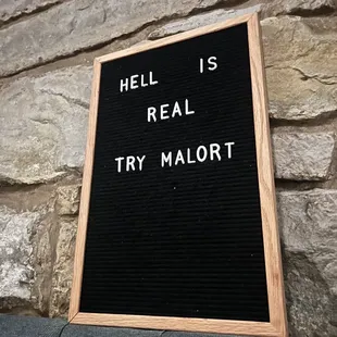 a sign that says hell is real try majort