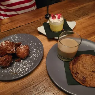 a plate of cookies and a glass of milk