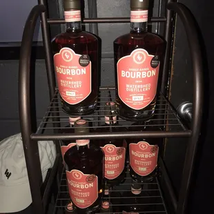 a rack of bourbon bottles