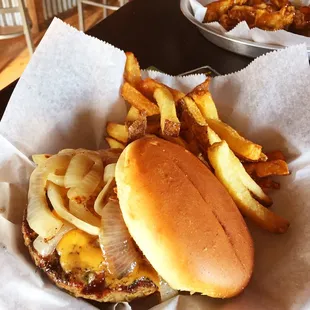 Merkdt cheeseburger with carmelized onions and hand cut fries!