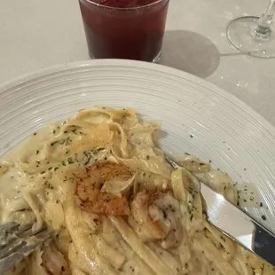 Shrimp Alfredo and dark cherry old fashioned