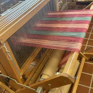 Looms for weaving