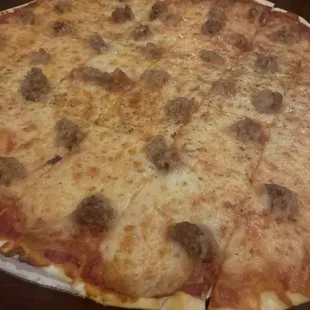 Sausage thin crust pizza