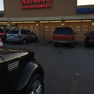 cars parked in front of the store