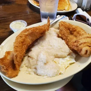 This is the breakfast plate but I subbed my meat with fried catfish. And yes, one big ol pancake peeking out.