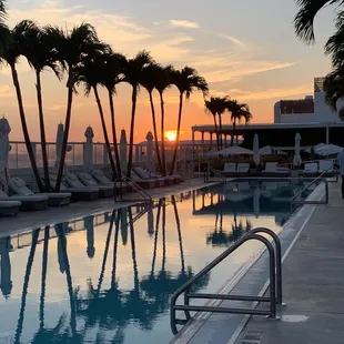 Sunset by the rooftop pool