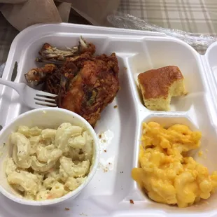 1/4 white meat chicken meal with mac salad and mac and cheese.