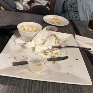 a plate of food left on the table