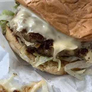 Turkey burger with cheese on a white bun so delicious. I love this place.