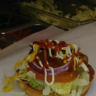 Our Dressed Bun w everything ( lettuce, tomatoes, Onions, pickles, mustard ketchup mayo)