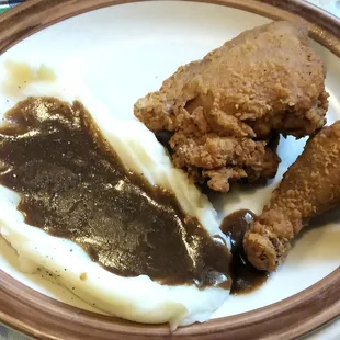 Dried out Fried Chicken, Season-less mashed potatoes with watery gravy