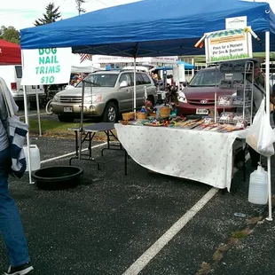 a man and a woman standing in a parking lot