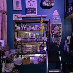 Various cups, behind the bar